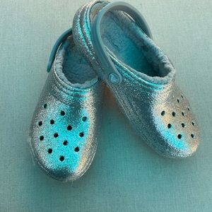 Crocs , faux fur lined , silver sparkle.